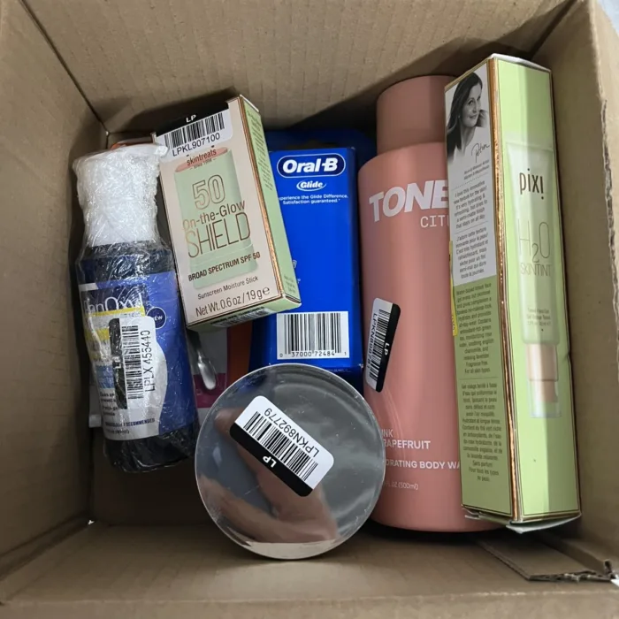 Box of 10 assorted beauty products. Overstock